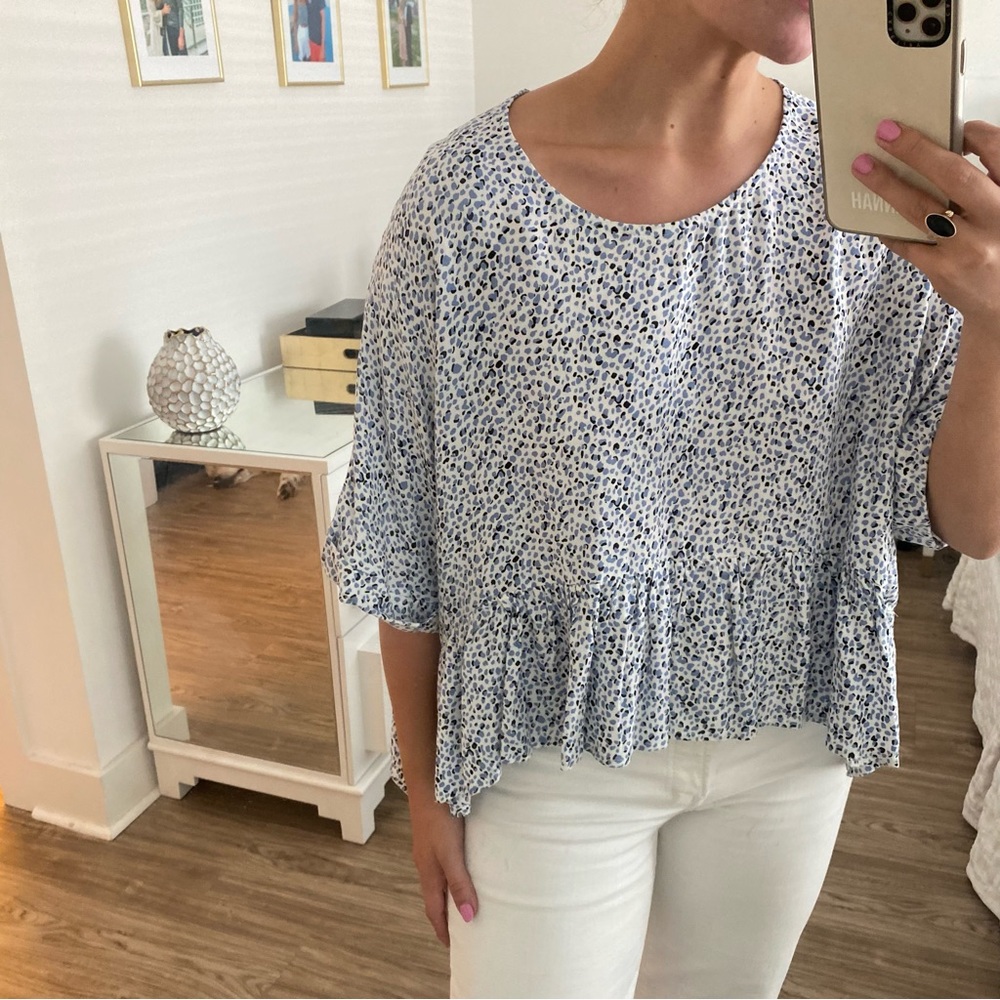 Flowy spotted top with ruffle detail